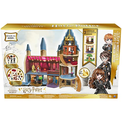 Wizarding World, Castello di Hogwarts Deluxe con 3 set di gioco Harry Potter inclusi, 22 accessori, 3 personaggi, luci e suoni, dai 5 anni, Esclusivo Amazon